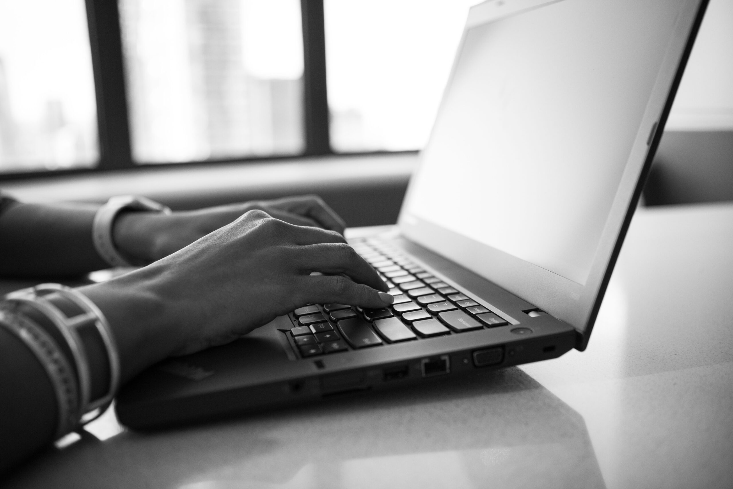 Estes Group embedded recruiting, typing on computer